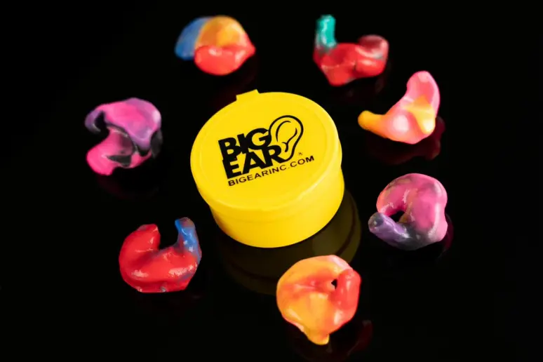 A full-seal custom-molded swimming earplug