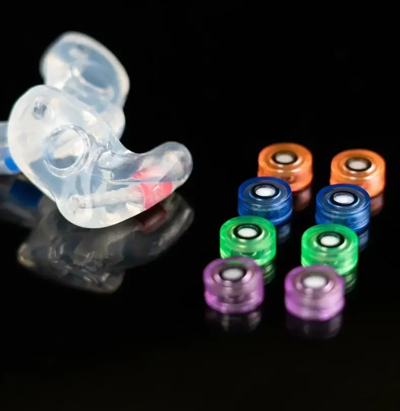 The One® custom filtered earplugs with interchangeable filters