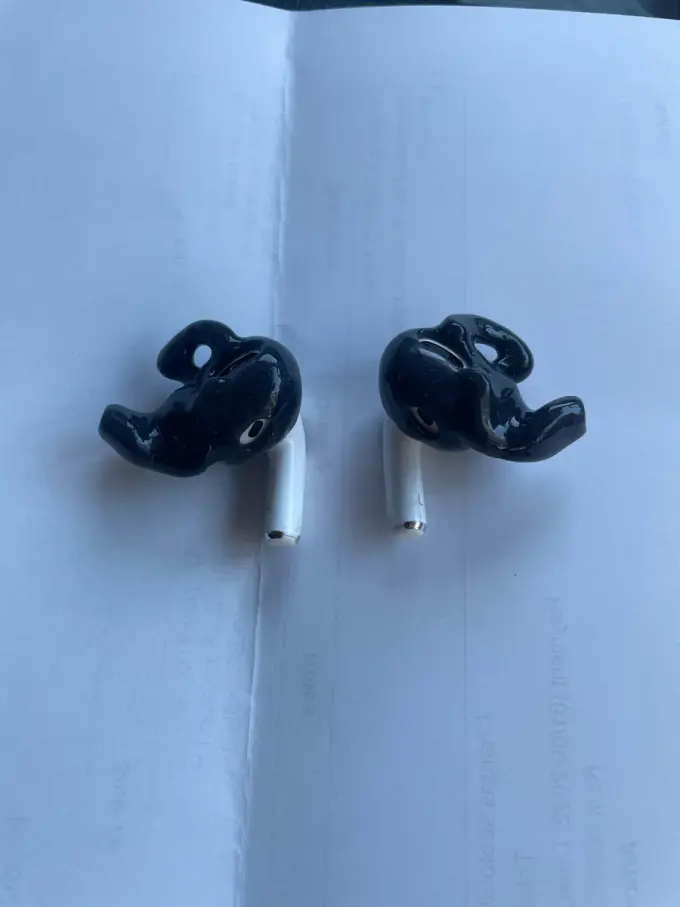 Black custom Big Ear AirPod Pro adapters marked left and right