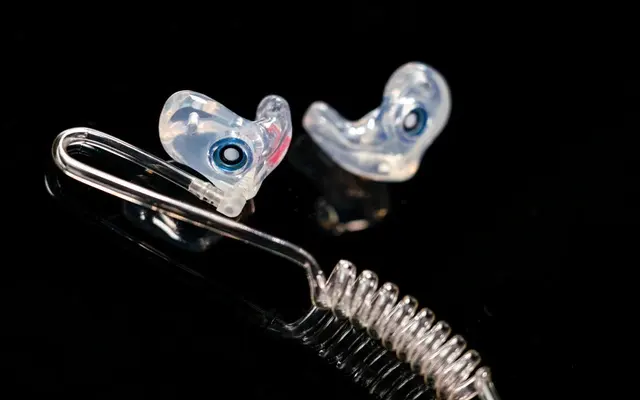 The One custom filtered earplugs for marching band