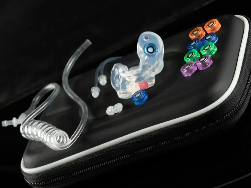 Big Ear custom earplug with its carrying case — the kit that ships to your door