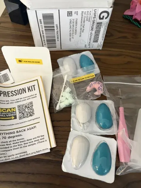 The contents of the Big Ear home impression kit laid out
